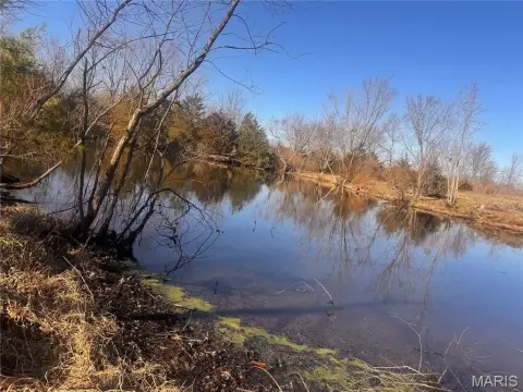 4.71 Acres with Established Pond