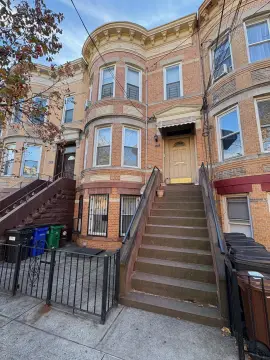 Ridgewood Three-Family Brick Home