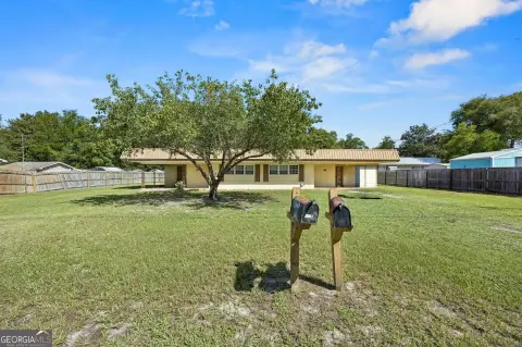 Occupied Duplex with Carport