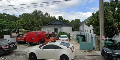Triplex with Detached Two-Story Building