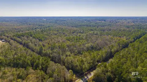 Expansive Land with River Frontage