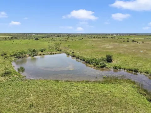 Expansive Bertram Land with Pond