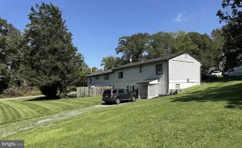 Quadplex With Adjacent B-1 Lot