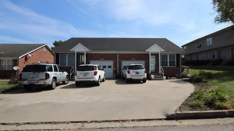 Brick Duplex with Attached Garages