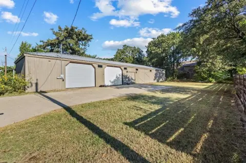 Land with Workshop Near Lake