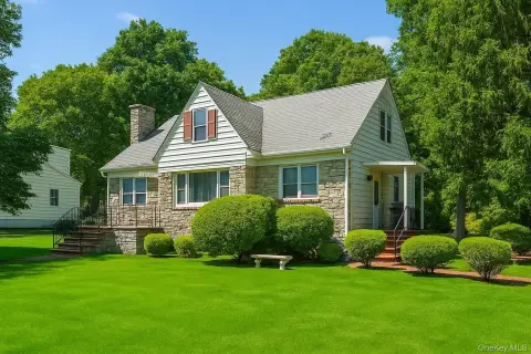 Charming Two-Family Home with Stone Facade