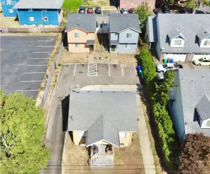 Three Detached Homes on Large Lot