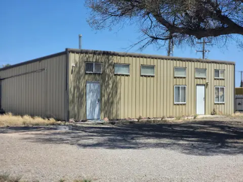 Fenced Metal Warehouse