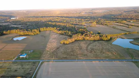 Farmland with Wooded Back Area
