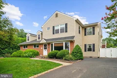 Owner-Occupied Duplex with Private Suite
