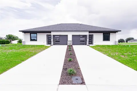 Duplex With Private Garages