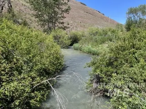 Mountain Home Land with Creek