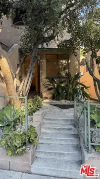 Spanish-Style Duplex with Garden