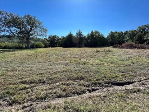 Cleared Land with Pond