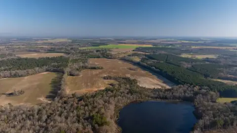 Diverse Farm with Pond Near Pineview
