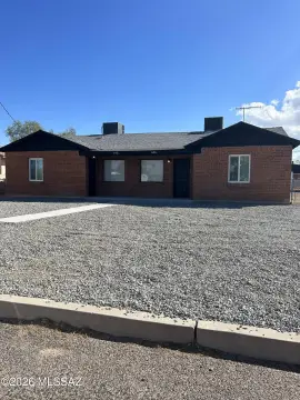 Versatile Triplex with Private Yards