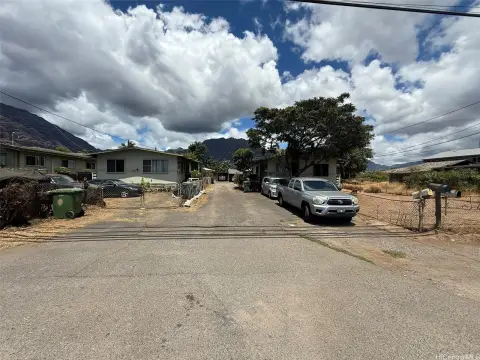 Four Detached Homes on Large Lot