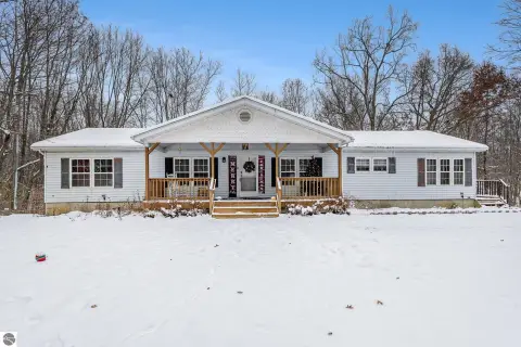 Two Residences on Wooded Acreage