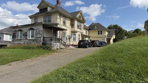 Four-Unit Colonial Multifamily Property