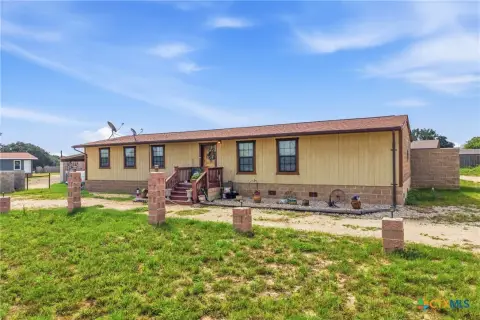 Triplex with Attached Studio Apartments