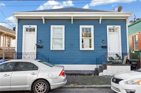 Charming Irish Channel Shotgun Duplex