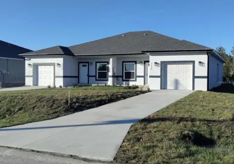 Duplex with Private Garages