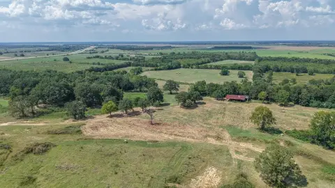 167 Acres Overlooking Red River