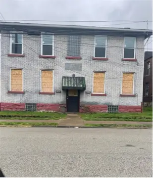 Brick Quadplex with New Windows
