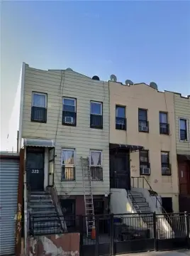 Triplex With Backyard