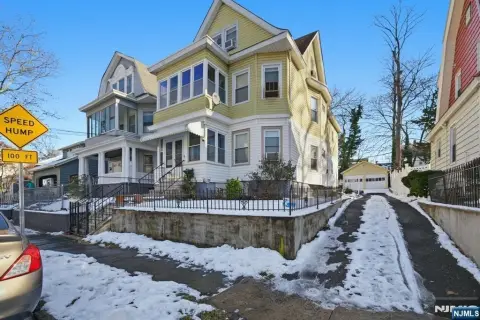 Charming Two-Family Home with Garage