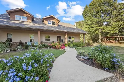 Sprawling Ranch with Custom Home