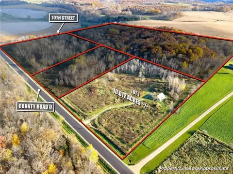 Wooded Land Parcel with Fencing