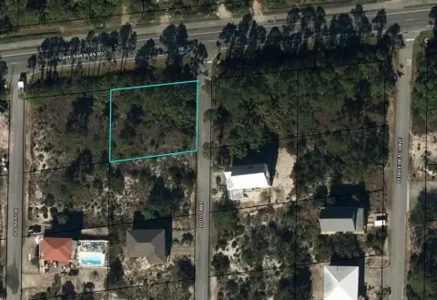 Heavily Wooded Beachside Corner Lot