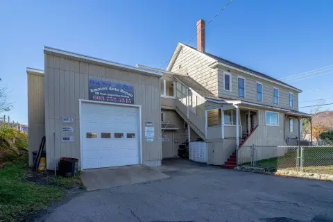 Versatile Multi-Family with Garage Bays