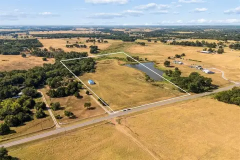 Fenced Agricultural Land with Shop