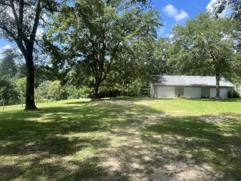 Versatile Land with Shop Building