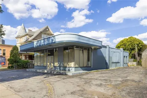 Freestanding Building in Emerging District