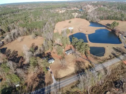 Commercial Land with Existing Improvements