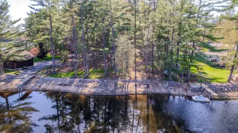 Wooded Land with Sandy Beach
