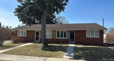 Brick Duplex with Attached Garage