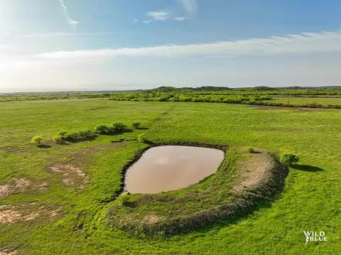 Improved Land with Wind Lease