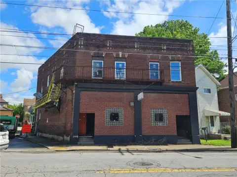Versatile Commercial Building with Redevelopment Potential