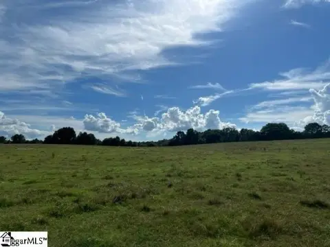 Unzoned Pasture Land with Pond