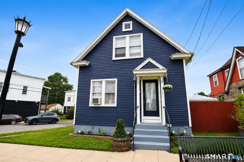 Duplex with Detached Three-Car Garage