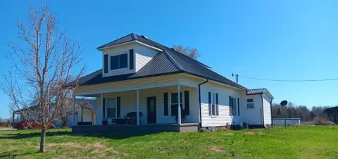 Farmhouse with Detached Garage and Shop