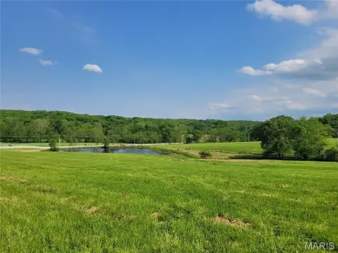 Picturesque Acres with Pond