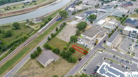 Fenced Commercial Land
