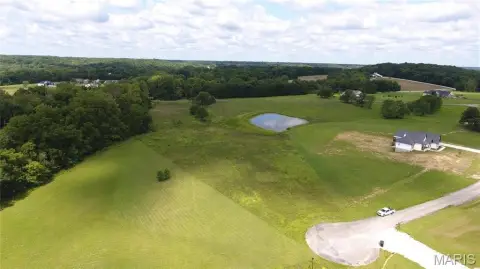 Residential Land Backing to Pond