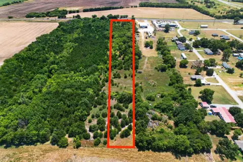 Partially Cleared Wooded Land