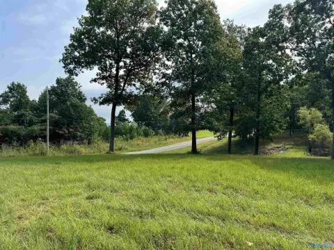 Land with Pond and Bluff